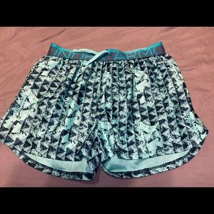 Blue patterned under armor shorts.